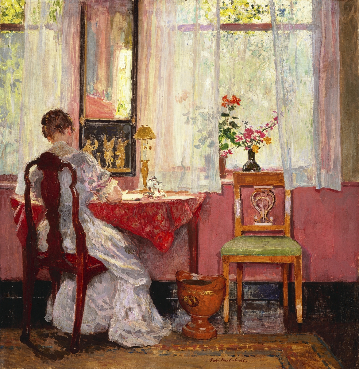 An impressionist painting of a white woman with brown hair in a bun and a white Edwardian-style dress. Seen from behind, she is writing at a half-moon table covered with a red cloth. Two open windows and a decorative mirror are on the pink and brown wall in the background, and a gold wastebasket and chair are to her right. Two pots of orange, pink, and yellow flowers are on the windowsill, and trees can be seen through the gauzy white curtains.
